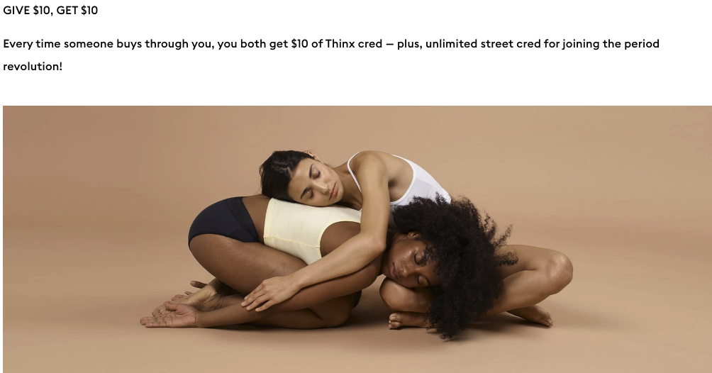 Thinx referral program promotion: 'Give $10, Get $10.' Text explains that both referrer and friend get $10 in Thinx credit for every purchase. Below, two women in Thinx underwear sit on the floor embracing against a neutral background, symbolizing comfort and connection.